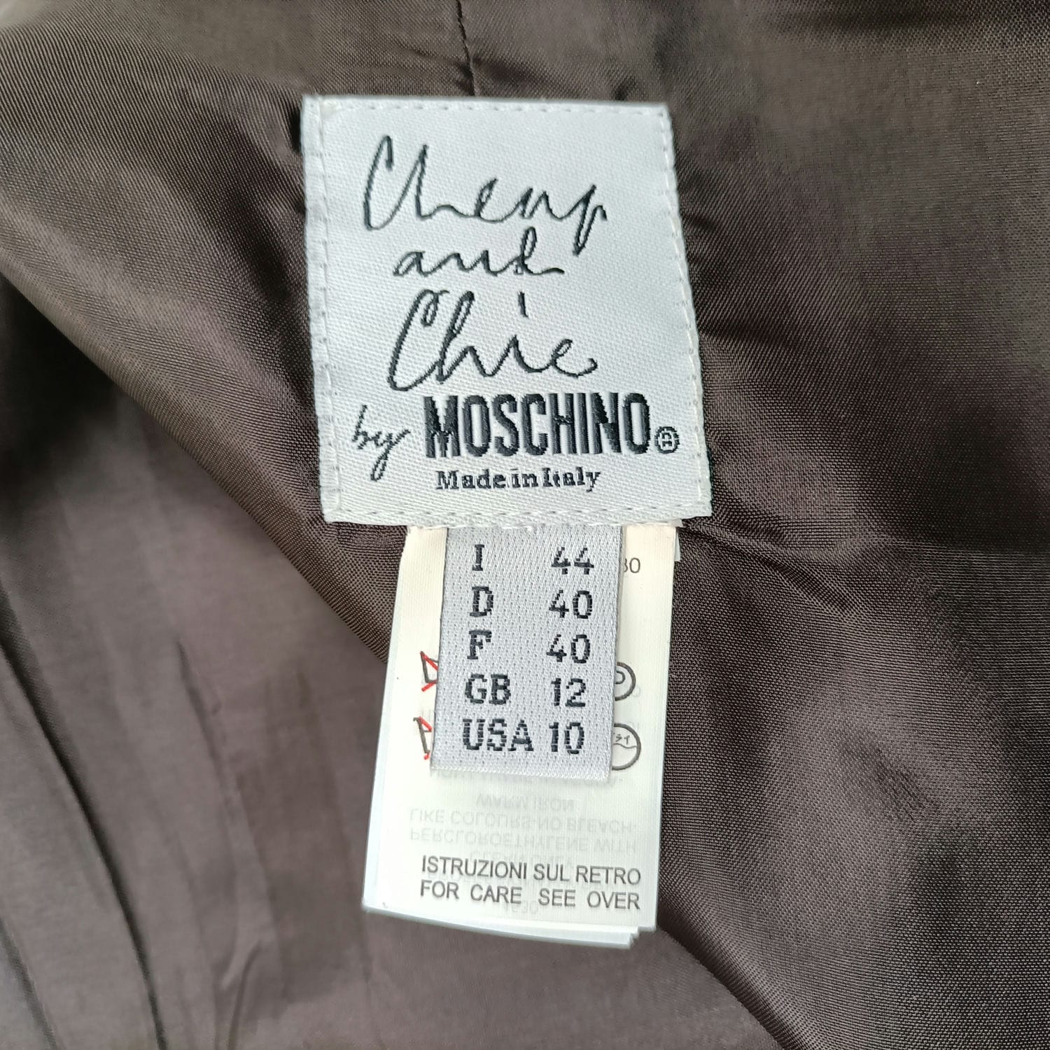 Tailleur con scarabeo Moschino Cheap and Chic 1990s