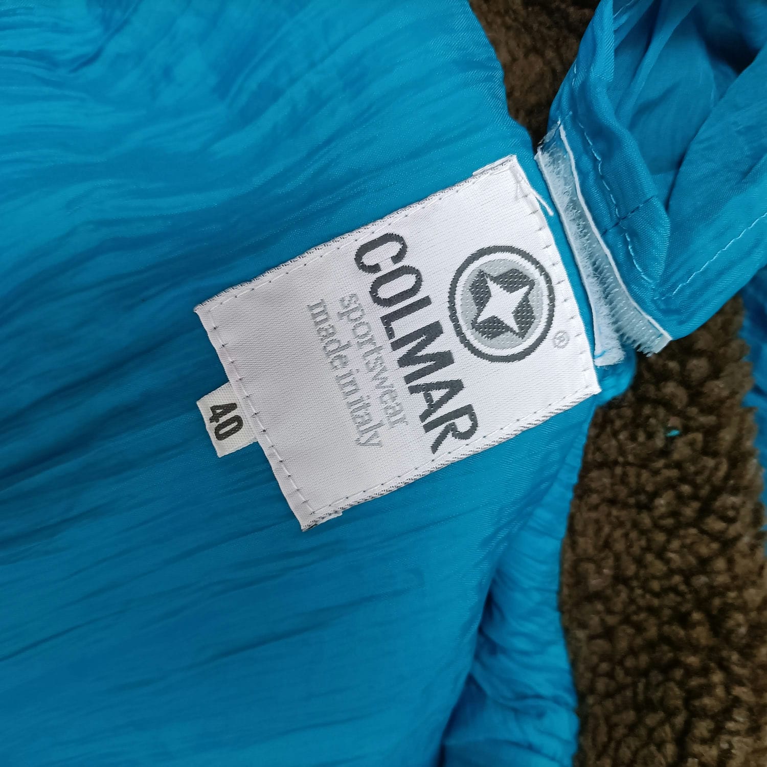 tuta da sci turchese