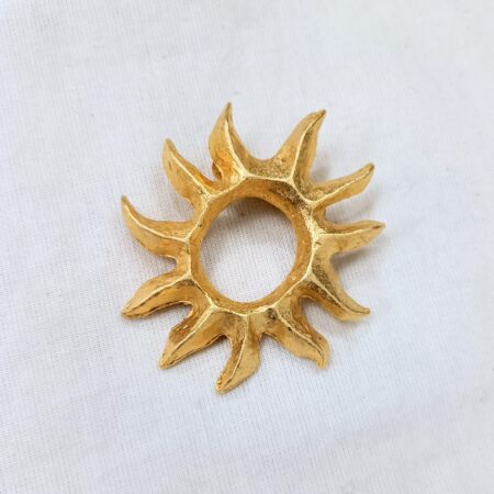 spilla sole