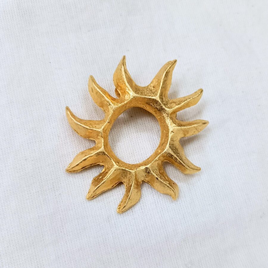 spilla sole