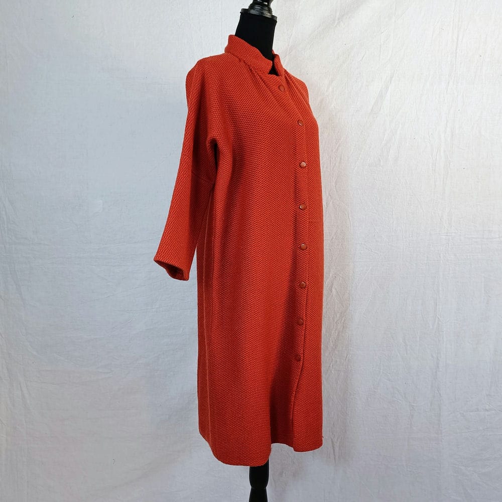 brick red coat