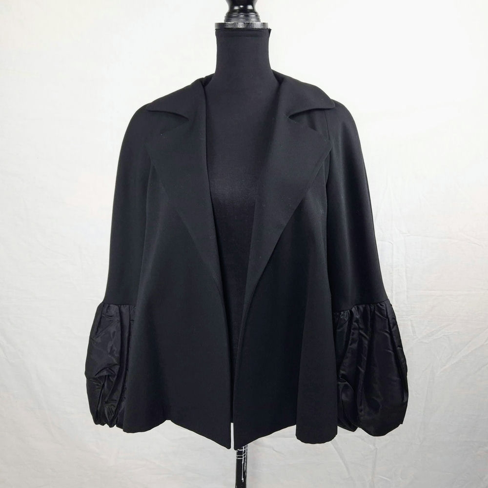 giacca con maniche a sbuffo