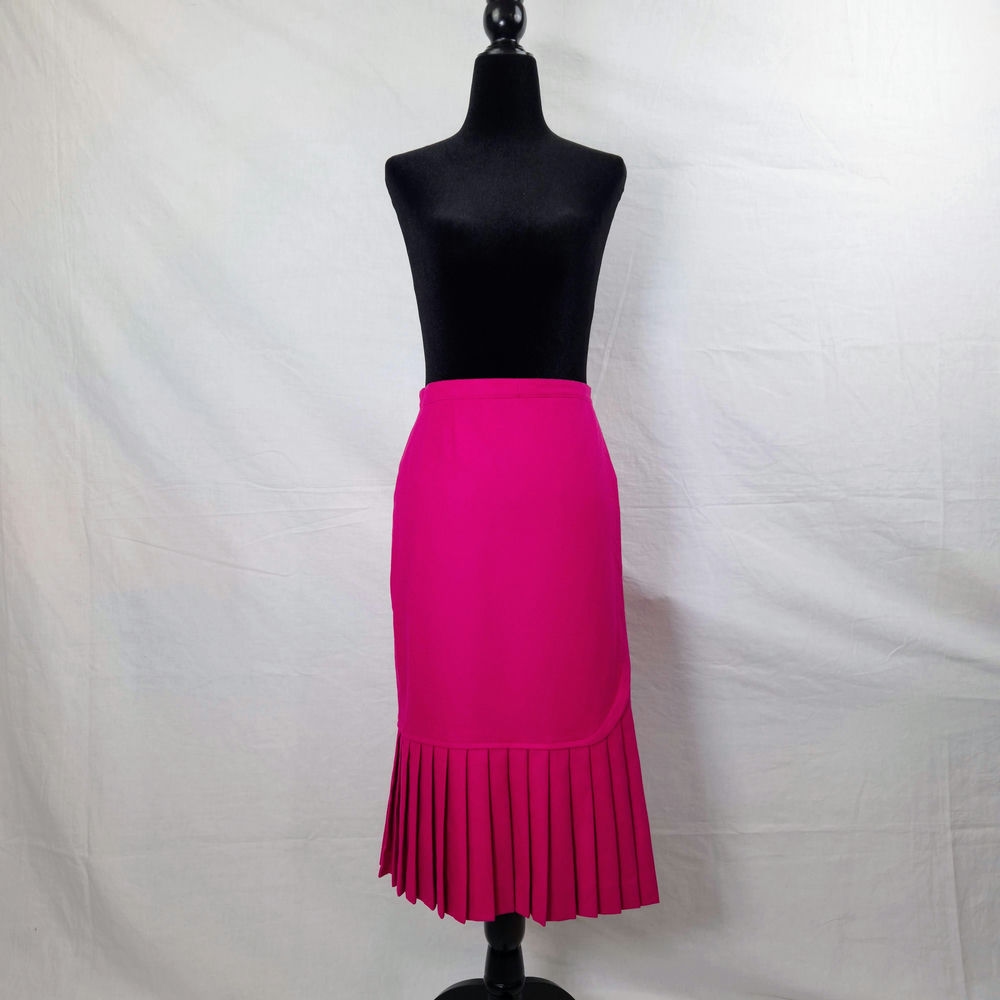 Gonna rosa con pieghe