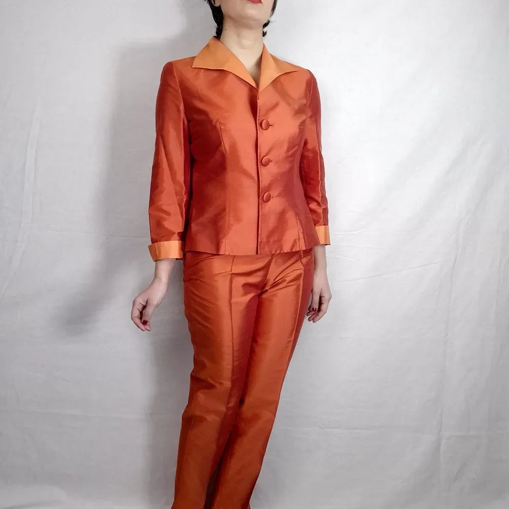 orange pants suit