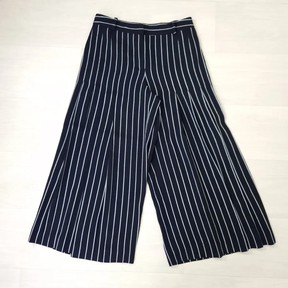 gonna pantalone a pieghe