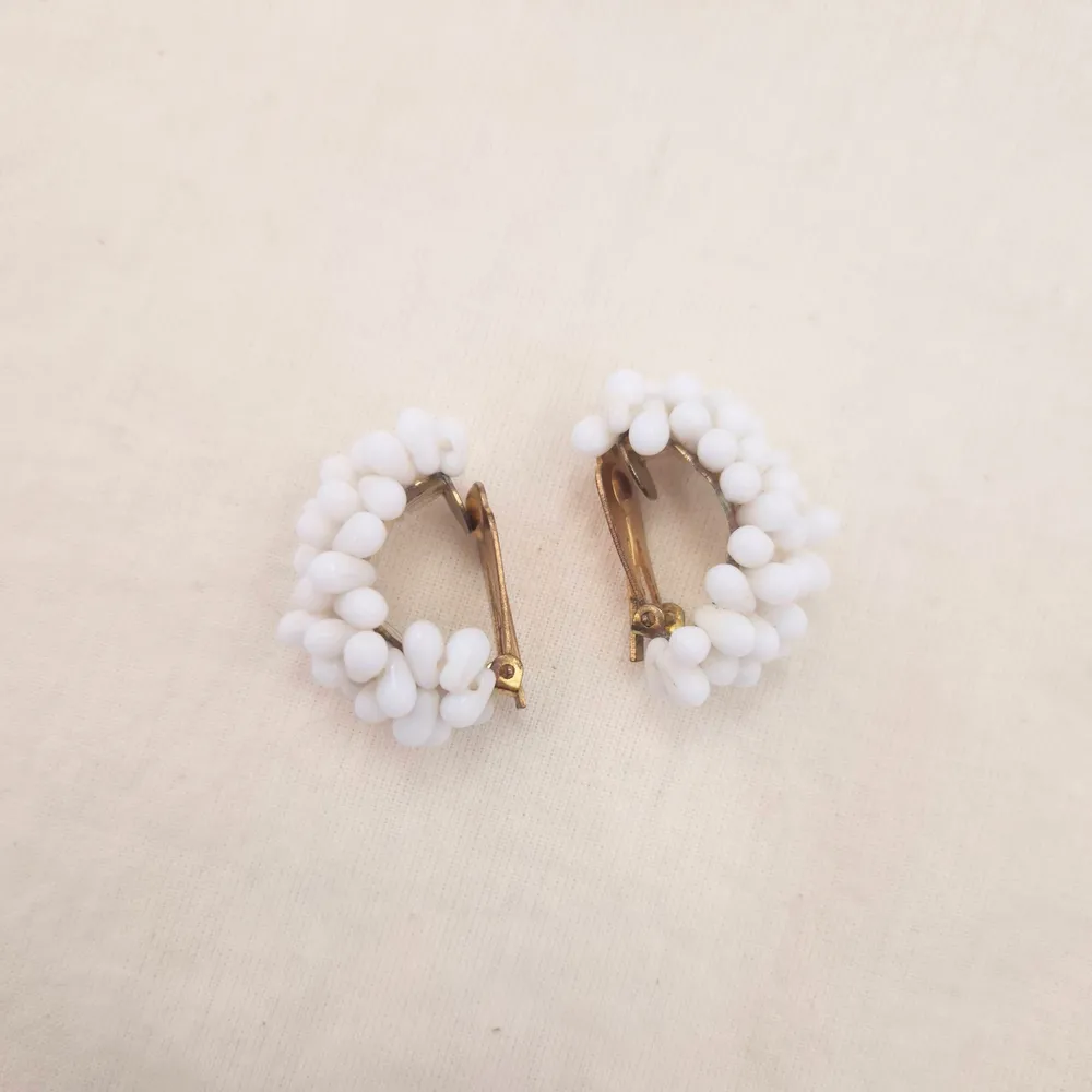 white earrings