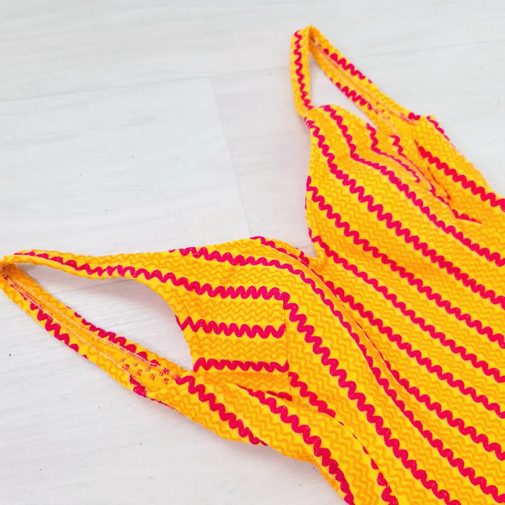 costume giallo rosso vintage